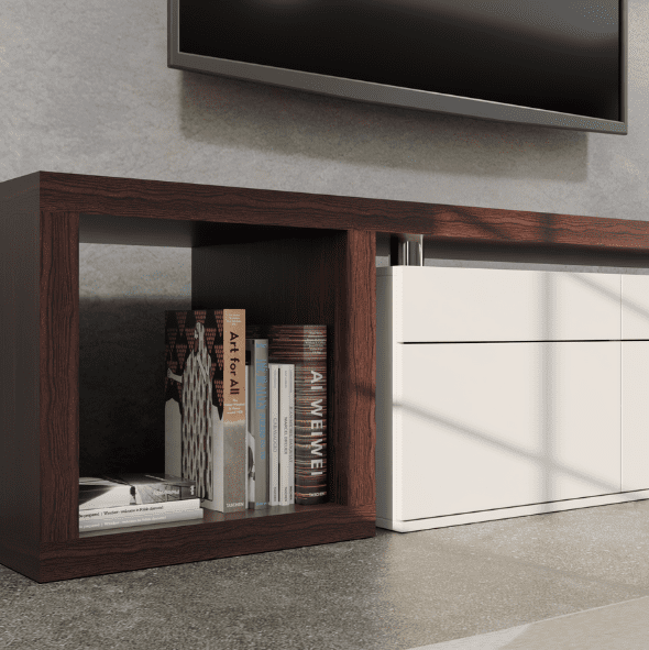 A modern TV stand with a dark wood open shelf holding books and a white cabinet with drawers, featuring a small plant on top.