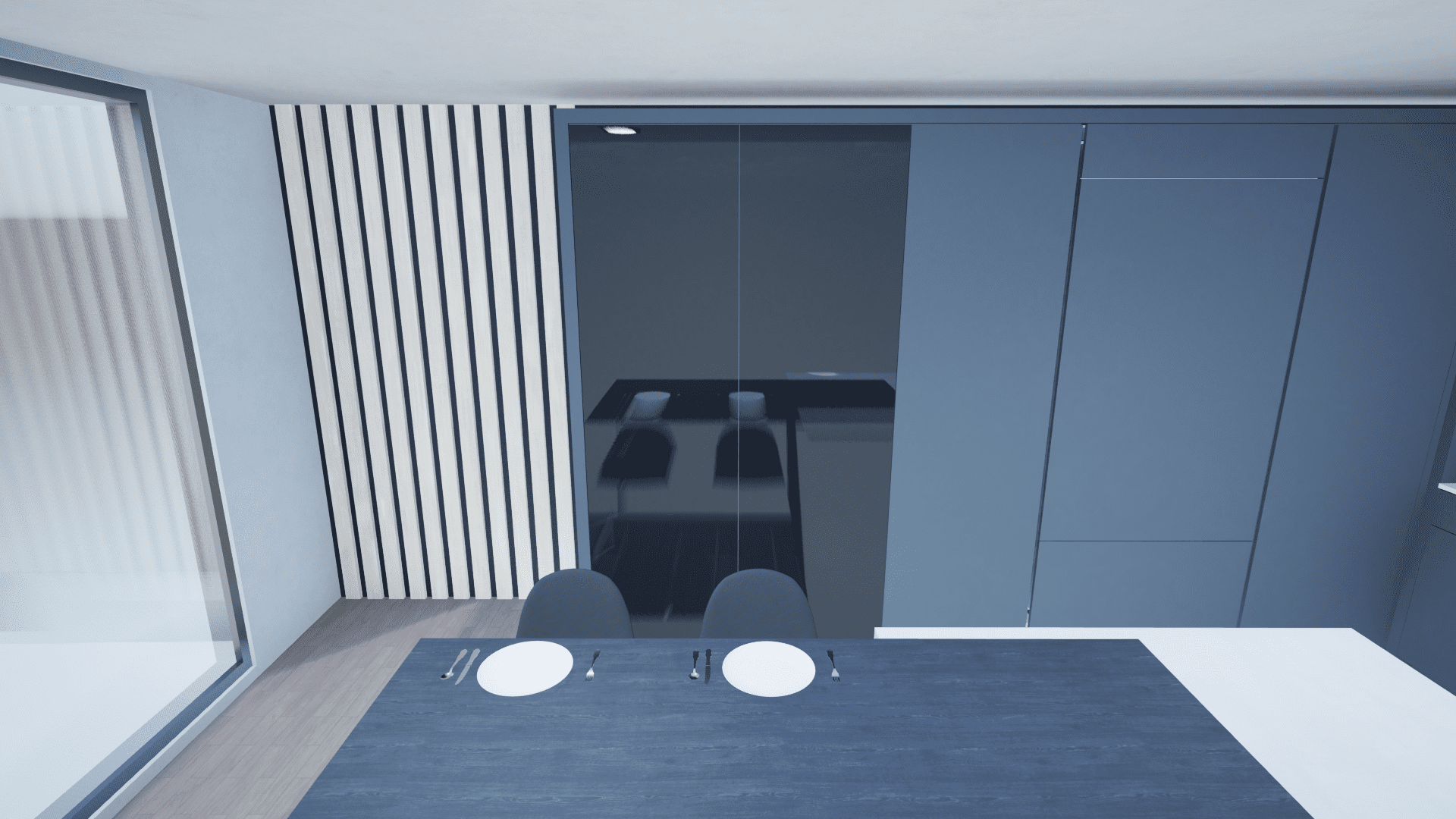 A modern dining area with a dark blue table set for two, matching chairs, and built-in cabinets against the wall; large window on the left.