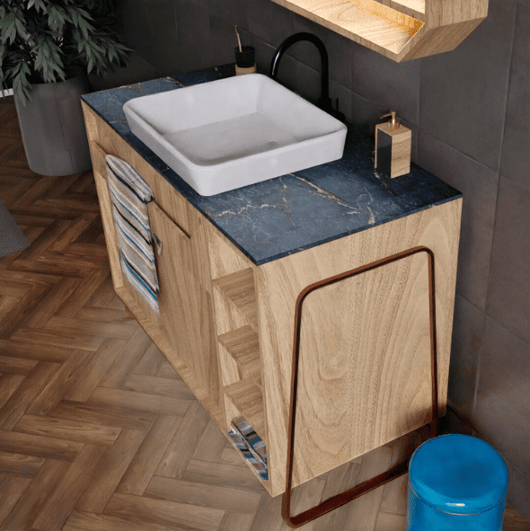 A modern bathroom vanity with a rectangular white sink, black faucet, blue marble countertop, wood cabinets, and a striped towel hanging on the side.